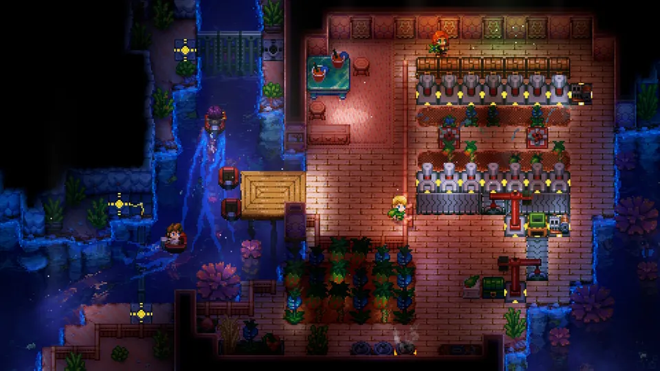 An underground base with crops, crafting stations, and waterways in Core Keeper
