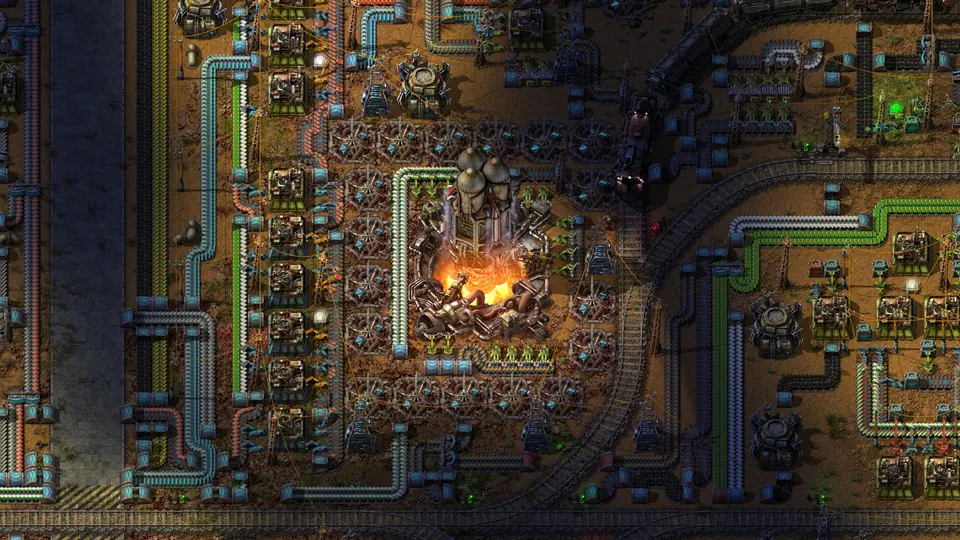An automated Factorio factory with conveyor belts, pipes, and production lines