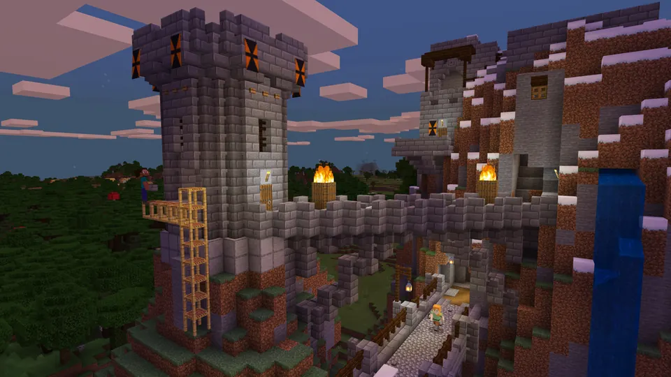 A stone castle and watchtower built into a hillside in Minecraft